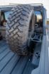 Picture of Jeep Gladiator Tire Carrier Universal Stand Up In Bed For 19+ Gladiator DV8