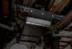 Picture of 2016-2022 Toyota Tacoma Transfer Case Skid Plate - Steel Raw Cali Raised LED